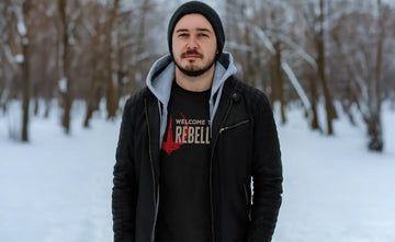 Person layering novelty t-shirts in winter with hoodie and jacket – guide on how to layer t-shirts in winter.