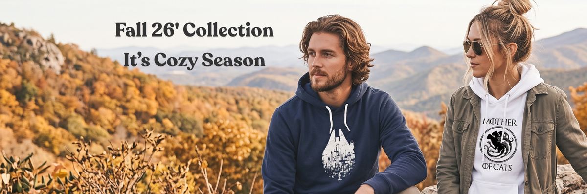 Two people wearing BustedTees hoodies outdoors in fall